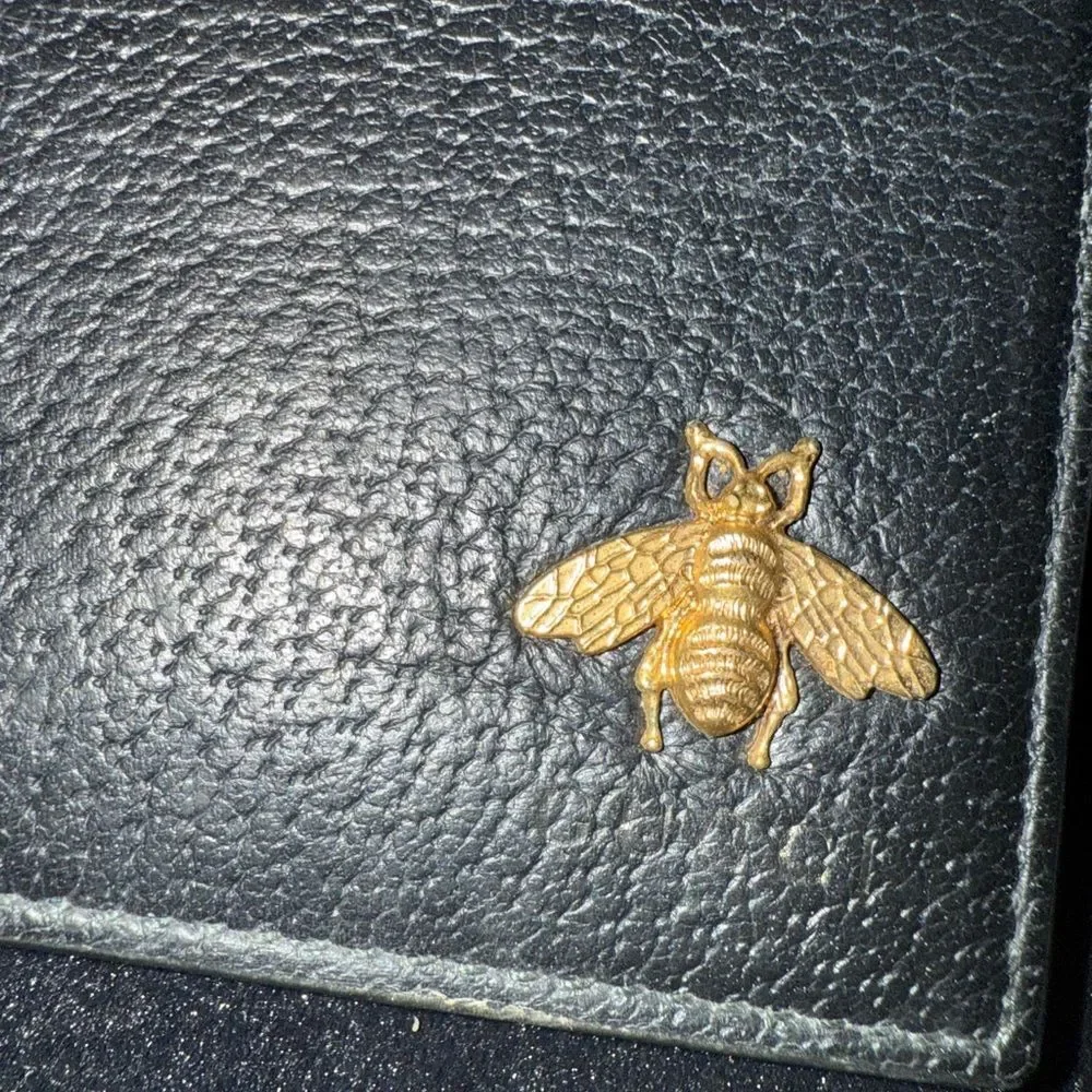 Brand new men’s Gucci Black Leather Wallet with Gold Bee Accent comes with box